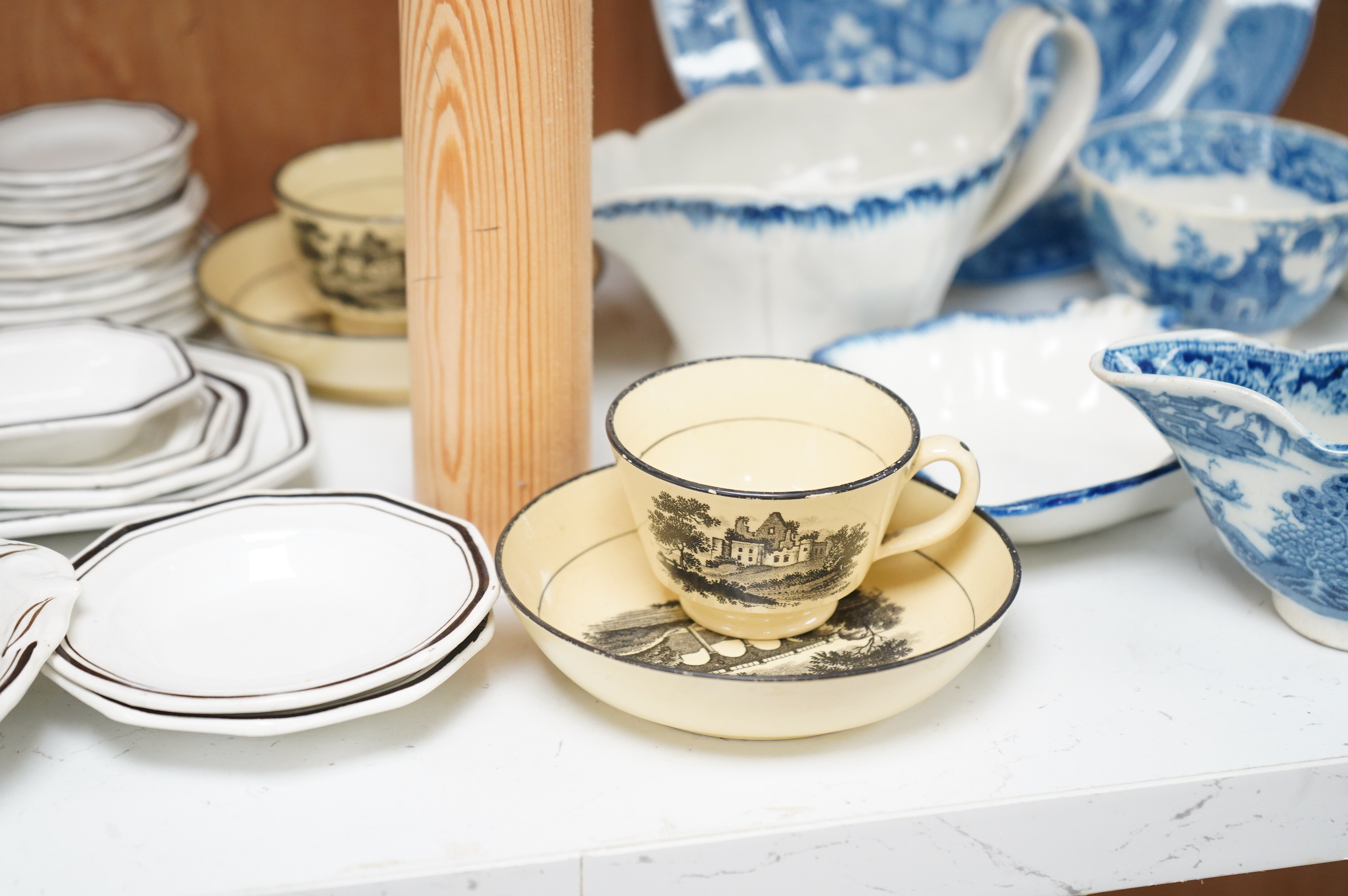A collection of early 19th century English blue and white pearlware leaf dishes, chestnut baskets, Victorian dolls house dinner service and other pottery